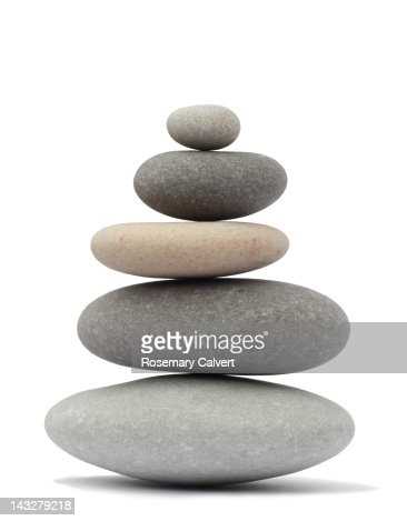 Counselling strategiesa stack of round pebbles on background the blue sky